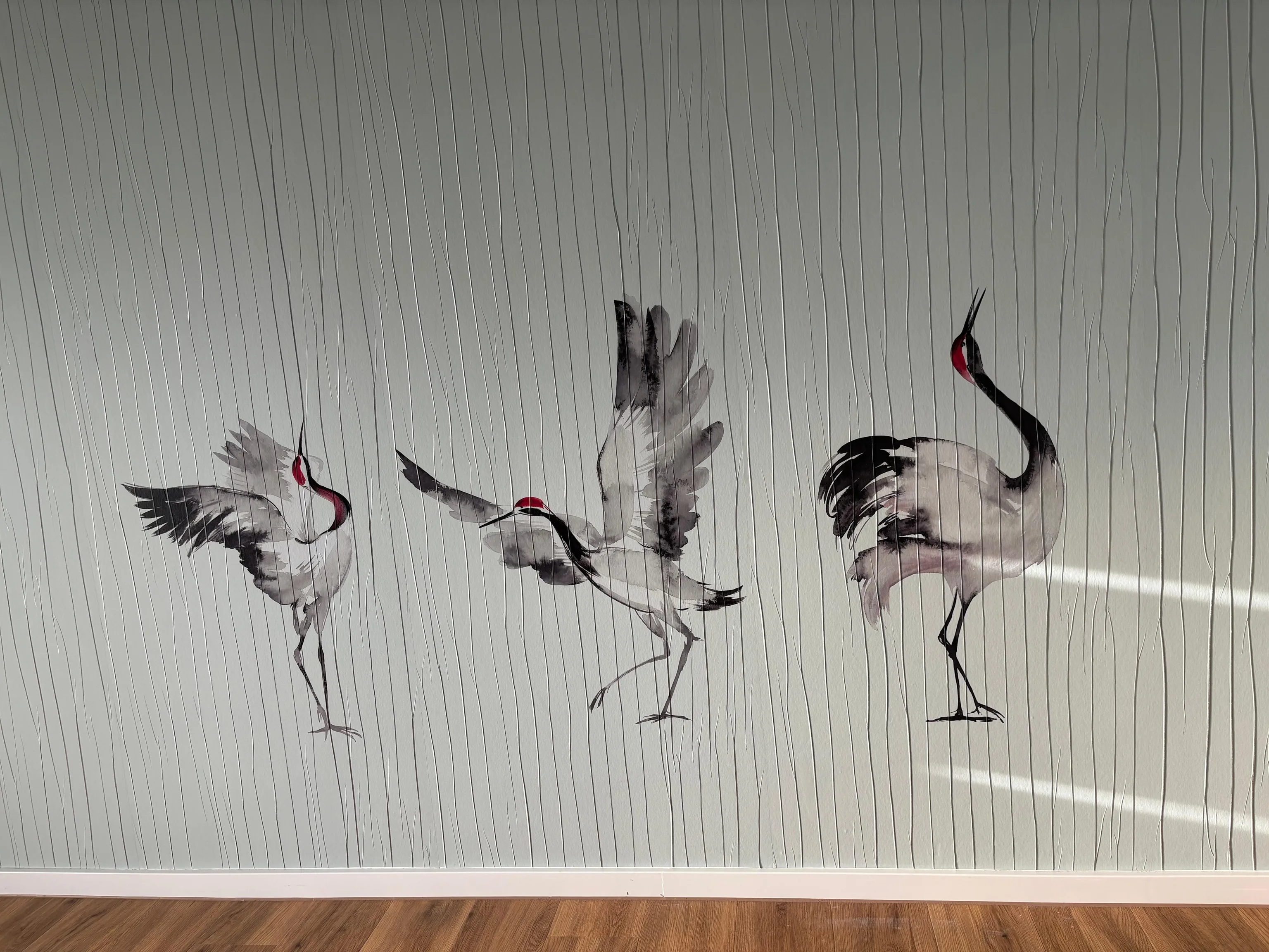 Motivtapete mit Kranichen als Akzentwand